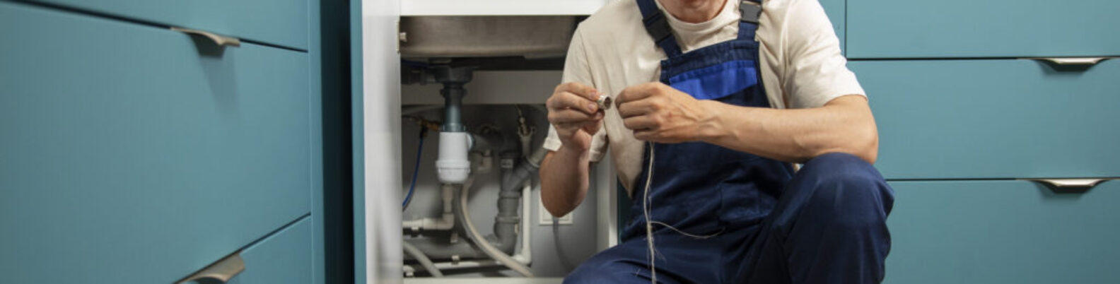 male-plumber-working-fix-problems-client-s-house